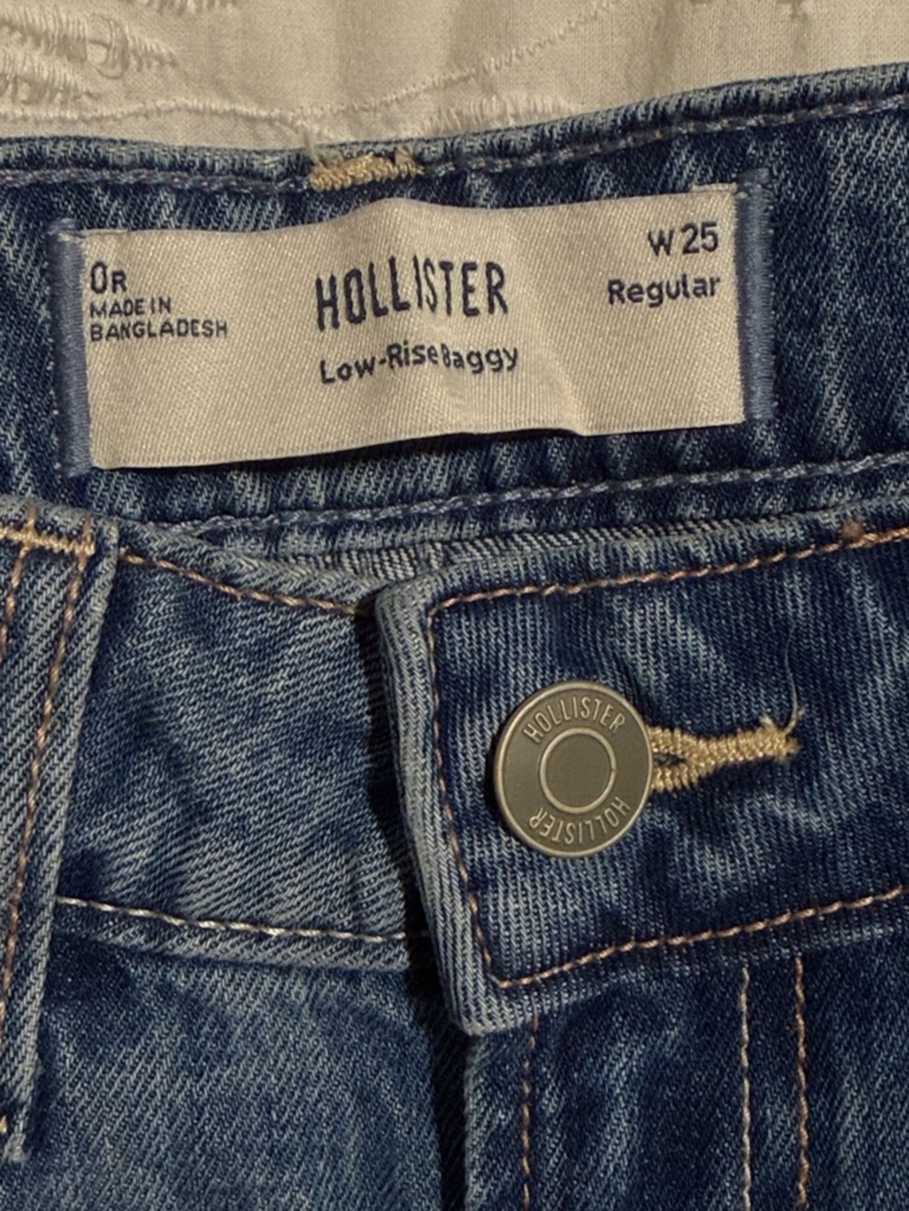 Hollister Men's Relaxed Low-Rise Jeans in Dark Blue Denim